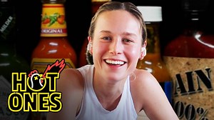 183K views · 3.1K reactions | Brie Larson is the box office-shattering star you know from films like Room, Captain Marvel, and many more. And now, she’s got her own YouTube channel. But how is she with spicy food? Find out as the Avengers alum takes on the wings of death from her couch and discusses everything from ComicCon to mushrooms. | Hot Ones | Facebook