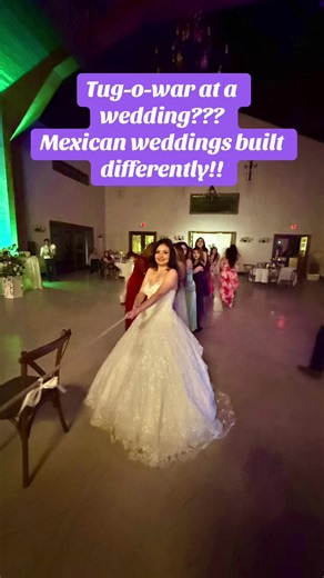 Bride Joins Fun Tug of War at Mexican Wedding Game