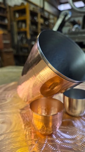 A bit of a mess with 20 minutes of video crammed into this. 19ga, 99.5% pure copper being spun over a stainless steel tumbler made a few months back. Holds about 30oz. Wrong circle sizes to start created a few issues but they are locked together and a heavy hand feel for sure! I may be making more if I decide to spin some more stainless ones. #metalspinning #metalart #stainlesssteel #copper #metalartist | Northwest Metal Spinning