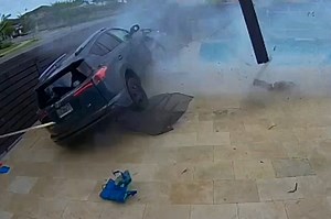 Car skims across pool in this heart-stopping crash