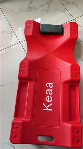 A car creeper is useful for working under a workshop car.