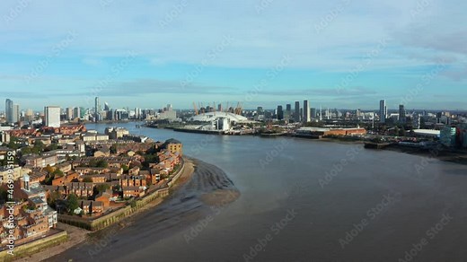 Aerial bird's eye view of the iconic O2 Arena near isle of Dogs and Emirates Air Line cable car in London, United Kingdom