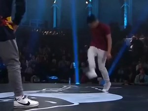 Dynamic Dance Performance on Stage with Audience