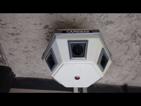 Inside a big scary rotating CCTV camera.