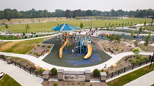 The Lions Volunteer Park playground is a sight to behold with inclusive playstructures that are made more fun by the natural hills and valleys of the location, as well as a sizeable outdoor fitness area. #playconnectsus #shapedbyplay #inclusiveplay Flagship Recreation City of Hugo, MN | Landscape Structures Inc.