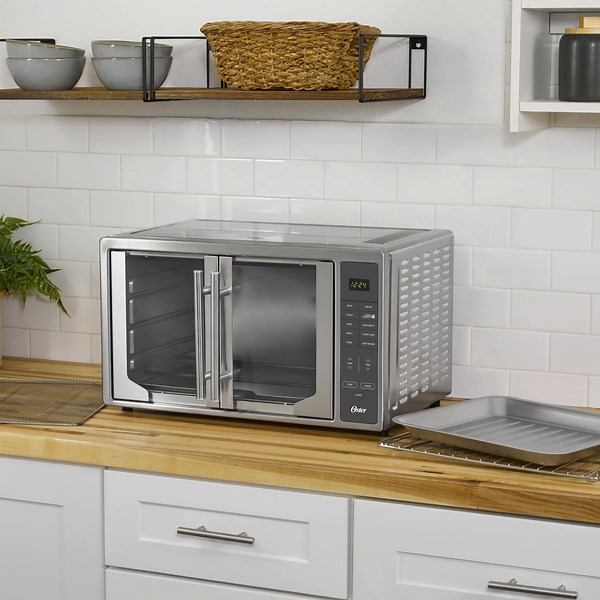 1.6K views · 37 reactions | Meal prep has never been so easy! The Oster Extra-Large Digital French Door Oven fits up to a 15'' x 12'' baking pan, a full family size chicken, or 2 large pizzas, plus has 3 rack positions making it easy to accommodate a variety of meal sizes. Check out the link in bio to get yours. | Oster | Facebook