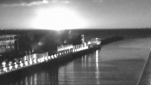A suspected meteor lights up the night sky over Melbourne's Port Phillip Bay (Supplied: Martha Cove Owners Corporation)