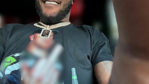Super Bowl Champ wears Sam Darnold t-shirt with middle finger up