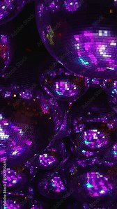 Disco mirror balls adorn parties, clubs, and events with colorful lights, creating mesmerizing display. Viewers are captivated by dazzling patterns and radiant, exuberant scenes in spectrum of colors