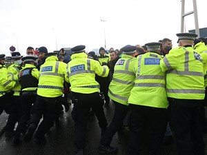 Man arrested as stranded lorry drivers clash with police