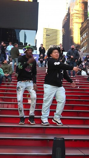 Urban Dance Routine on Red Steps Offers Creative Inspiration