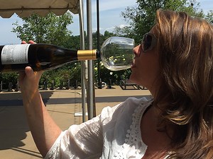 Guzzle Buddy, A Handy Device That Transforms an Entire Bottle of Wine Into a Personal Drinking Glass