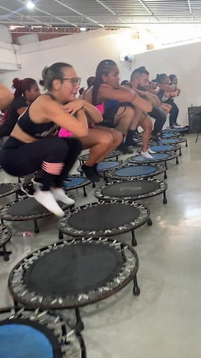 Synchronized Trampoline Fitness Class for Women