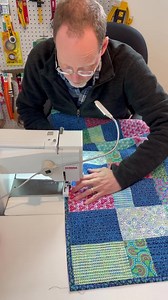 Binding - We use an all-in-one machine binding method for most of our quilts but showed in Modern Quilts Illustrated 15 4 different binding methods we use from time to time. That’s our Al Fresco quilt Bill’s binding, made with our Sunnyside line, in stores now. We have kits for this beginner-friendly quilt on our website. #modernquiltstudio #modernquiltstudiopattern #igquiltfest2022 #igquiltfestday26 #binding #modernquiltsofinstagram #modernquilting #benartexfabrics #sunnysidefabric | Modern Qui