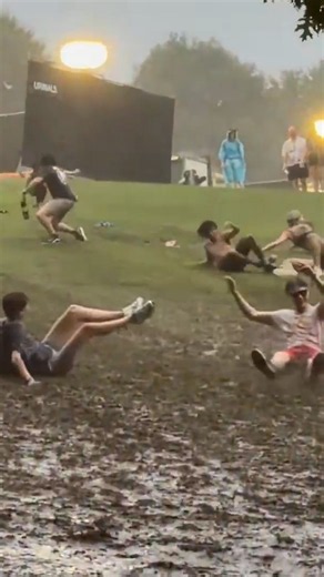 Woodstock Vibes: People turn rain delays into muddy slides | #mudfun