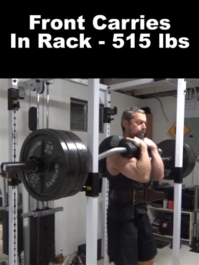 Front Carries In-Rack - 515 lbs. This is one of my favorite ways to develop anterior core strength (anti-flexion and bracing) and overall breathing capacity under load. I'm using a safety squat bar (@_marrs_bar) for this, set backwards so the load is shifted more to the front of the body. It's not exactly the same as a straight bar front rack (which is harder - I've done those, too) but it is more comfortable which allows you to use more overall weight. I've got the safety rails set just below t