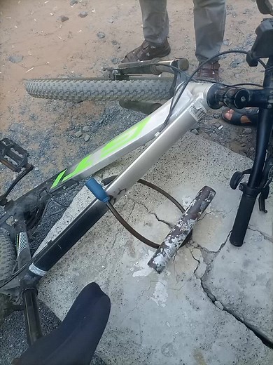 Inspecting a Damaged Bicycle Handlebar in Detail