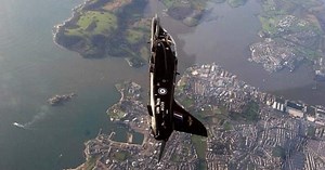 Royal Navy Hawk fighter jets soaring through the sky in Plymouth