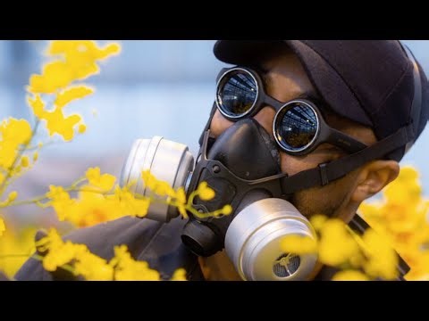 Meet the masked artist who conjured a concrete jungle of 20,000 orchids