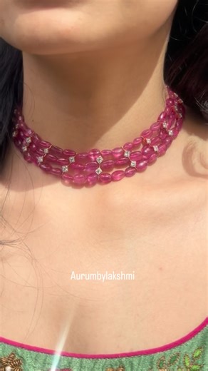 Aurum by Lakshmi on Instagram: "A ruby whispering secrets at my neck.🥀❤️ #aurumbylakshmi #rubyrose #necklace #swarosky #beauty"