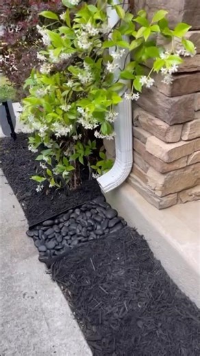 Replacing Gutter Downspout Splashblocks With Dry Creek Beds | Landscaping Tips