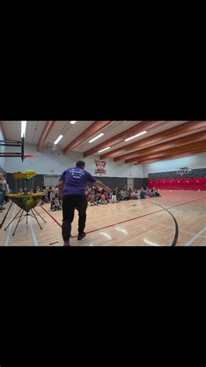 After missing a bunch, I had a second round of attempts and skipped the frisbee into the basketball net, reinforcing my messages around Growth Mindset, Resilience, Positive Focus, And Learning through Failure. The 200 elementary students from Kindergarten to Grade 6 had a blast and I'm teaching two full days of frisbee PE workshops! | Frisbee Rob