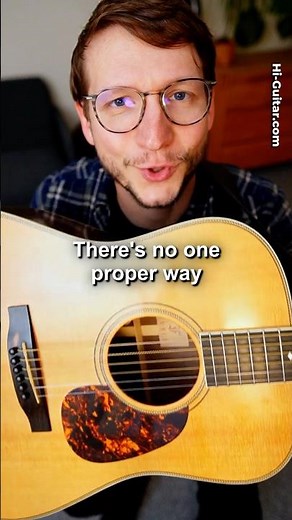 Proper Way to Hold a Guitar?