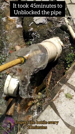 Unblocking a drain pipe with coke bottle#shorts#unblockdrain