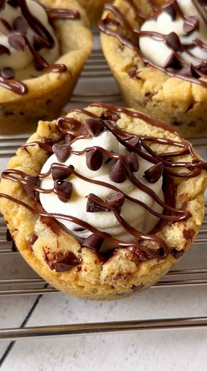 Cannoli Cookie Cups🥛🍪🤤 Holy Cannoli these cookie cups are the best! They’re easy to bake and no chill time is required. Full recipe below. https://sweetmonkey.blog/cannoli-cookie-cup/ Ingredients: * 1 cup unsalted butter, melted * 1/2 cup granulated sugar * 1 1/4 cup packed brown sugar * 2 large eggs, room temp * 1 1/2 tsp pure vanilla extract * 3 cups all-purpose flour * 1 tsp baking soda * 1/2 tsp salt * 3/4 cup chocolate chips Cannoli Frosting: * 1 1/2 cup whole milk ricotta cheese, strain