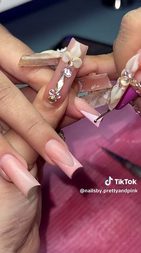 Hello Kitty x Cheetah Print Nail Inspo