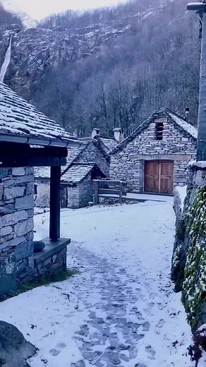 Serene Winter Scene in a Swiss Mountain Village