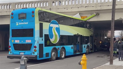 Spokane double decker bus collides with bridge; four people hospitalized