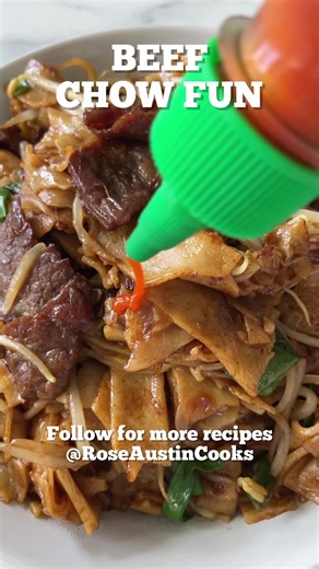 Quick and easy Beef Chow Fun recipe is made with beef, flat rice noodles and a delicious homemade sauce. Full recipe video linked in comment section. | Rose Austin Cooks