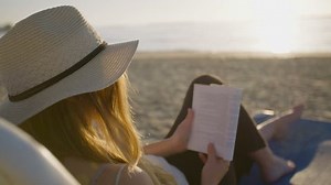 Beautiful Woman Reading Book On Beach Stock Footage Video (100% Royalty-free) 14347555 | Shutterstock