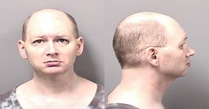 Cat beat to death with hammer, buried in yard