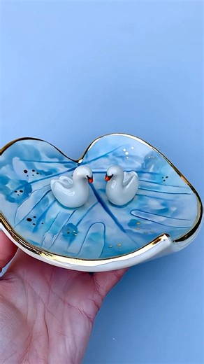 #satisfying #pottery art of how I press a leaf in clay to create a ceramic dish with swans in #love