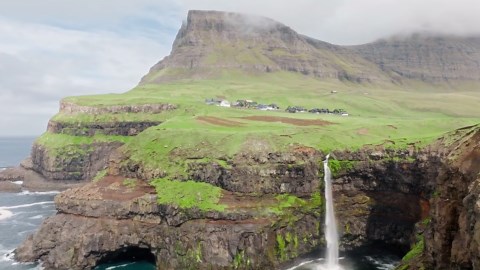 Gásadalur, Faroe Islands: Drone glides over waterfall cliffs