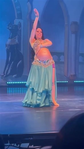 Very beautiful pregnant belly dancer