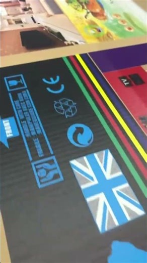 UV flatbed printer for coated cardboard.