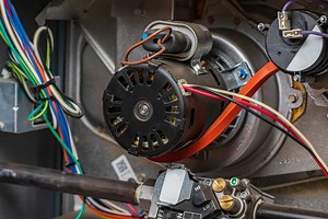 Furnace Blower Motor Hums But Won't Start? (We Have A Fix)