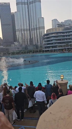34 reactions · 35 shares | The Dubai fountain, located on Burj lake at the base of the Burj Khalifa is the word's largest choreographed water fountain featuring dazzling display of water light and music.... people travel far and near to witness this amazing view....✍️ | Odogwu Arab money | Facebook