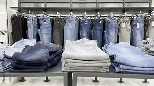 Store hanger with female clothes. clothes rack