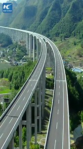 4.6M views · 62K reactions | Stunning aerial view of a giant bridge supported by high piers in mountains of Guizhou, China. #AmazingChina | China Xinhua News | Facebook