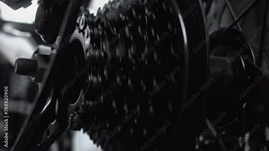 Cyclist On Bicycle Drivetrain System Chain Rotating. Gear System Bike Wheel. Cycling Drivetrain Derailleur Chain Cassette Spokes. Cyclist Chain Gear Shifting. Cycling Cranckset Bike Wheel Gearshift