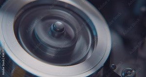 Close up of VHS video tape head spinning inside VCR player / recorder