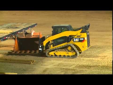 John Deere 333E track loader vs Competition 5500 LB lift