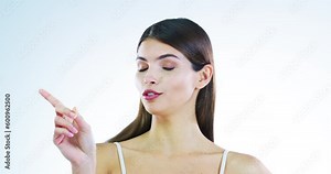 Woman, face no and finger gesture in a studio with protest. refuse and rejection answer. Isolated, white background and young female model portrait with denial and reject emoji hand sign alone