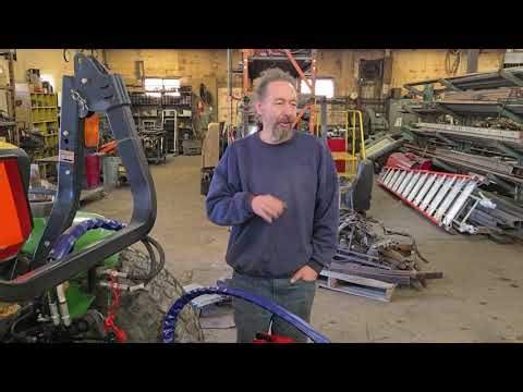 Minnesota Implement. Setting up a hydraulic 3 point top link on a utility tractor.