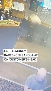 A bartender in the U.K. was captured on security camera video successfully tossing a hat directly onto the head of a happy customer. The owner of the pub, called The Dingle, said on TikTok their bar is "always providing exceptional service." https://abcnews.visitlink.me/Ht0DyH | ABC News