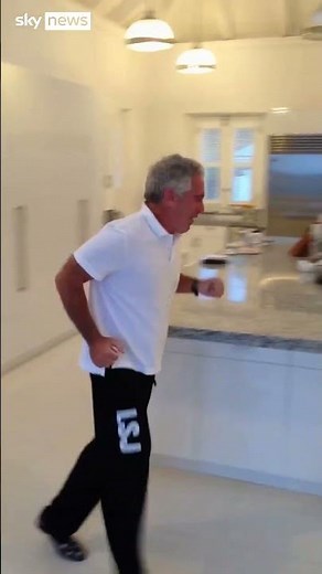 Video shows Epstein in kitchen of island home